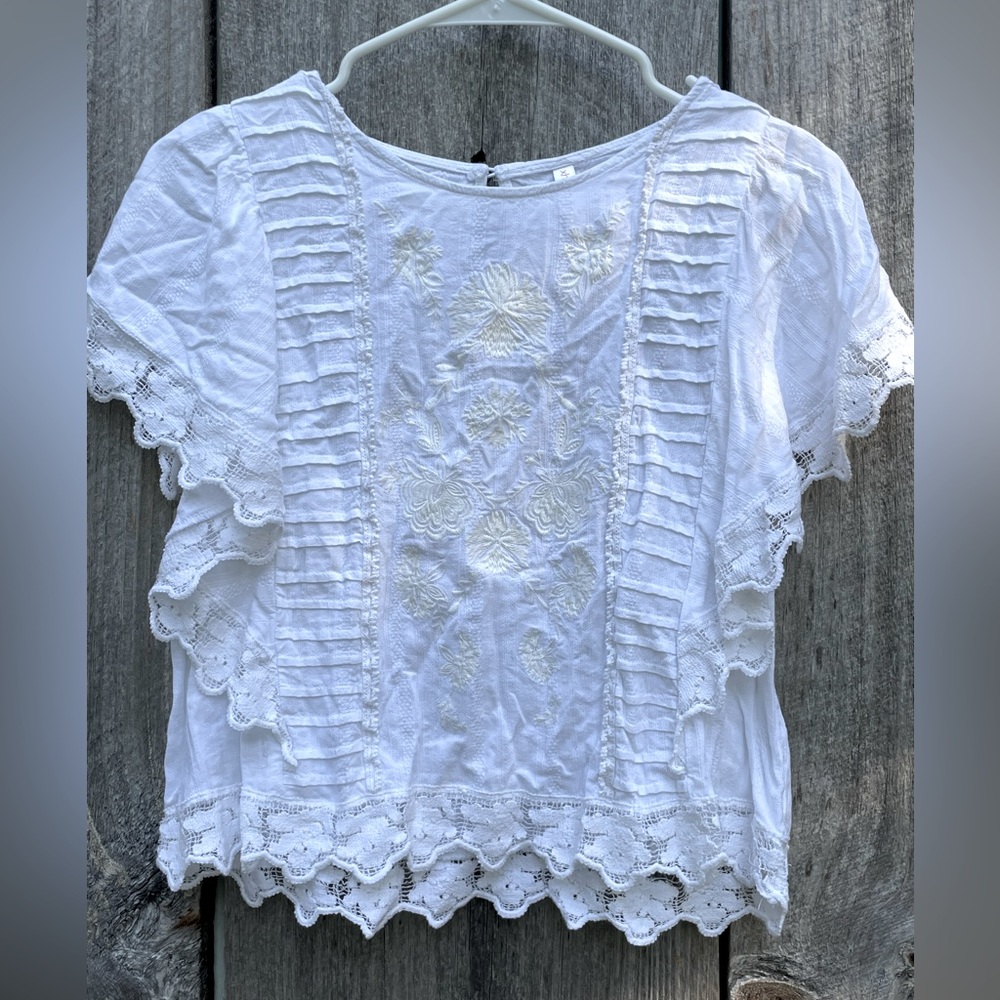 White lace and frill top.